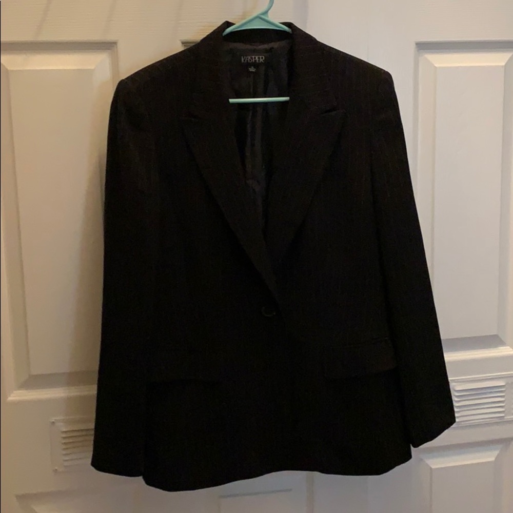 Black and white pin stripped suit jacket.